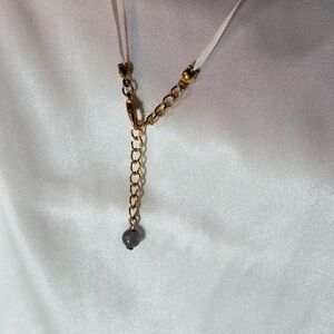 Elegant necklace made with an Iolite bead
